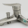 Hình mô tả nút chuyển đổi nhấn rút của củ sen Eurolife EL-ORCHID 01, giúp chuyển nước giữa đầu xả dưới và tay sen dễ dàng.